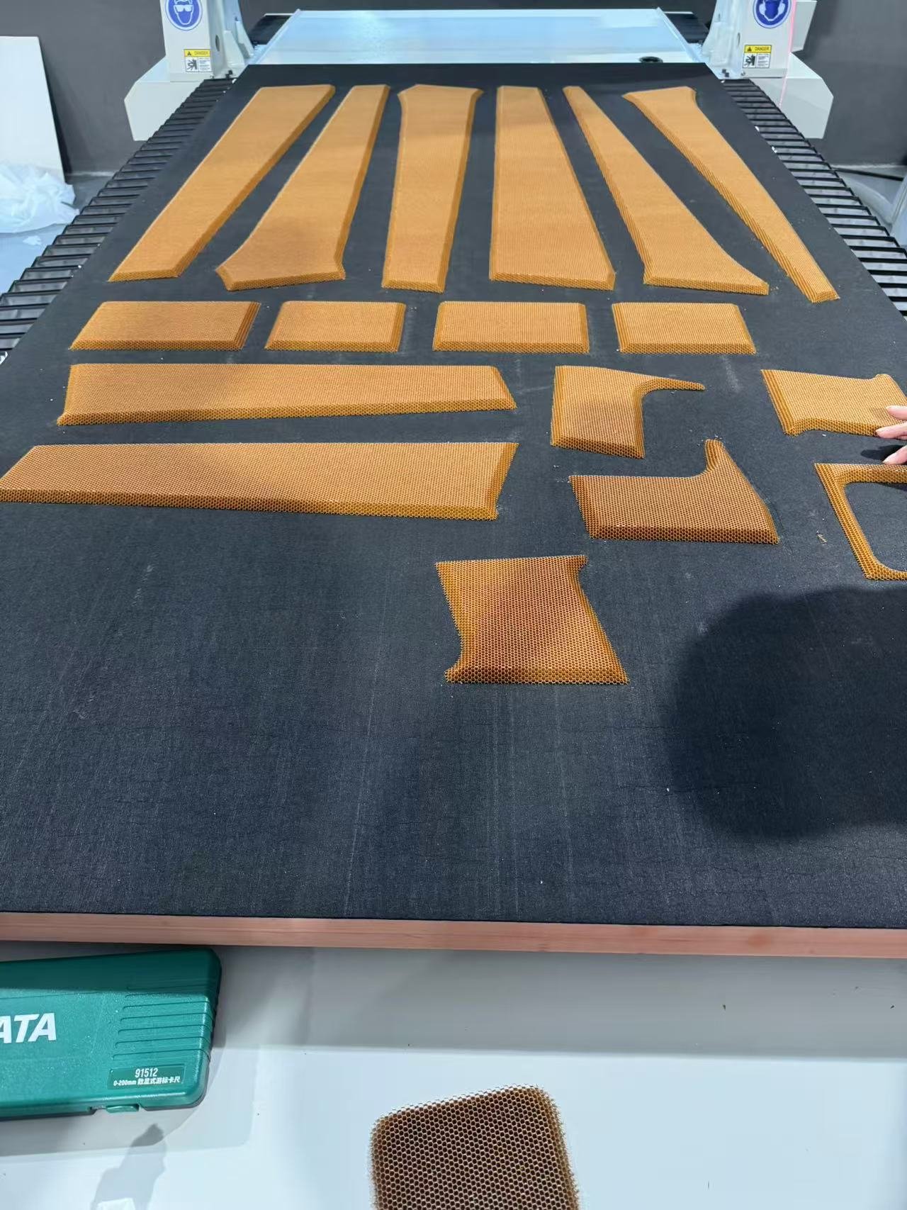 Nested honeycomb composite parts after machining